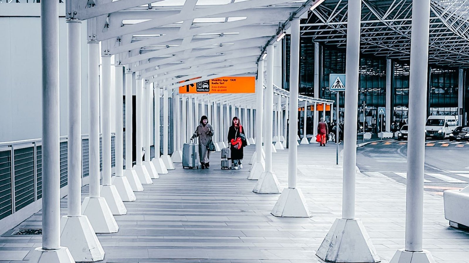 The pick-up point walkway outside an airport terminal